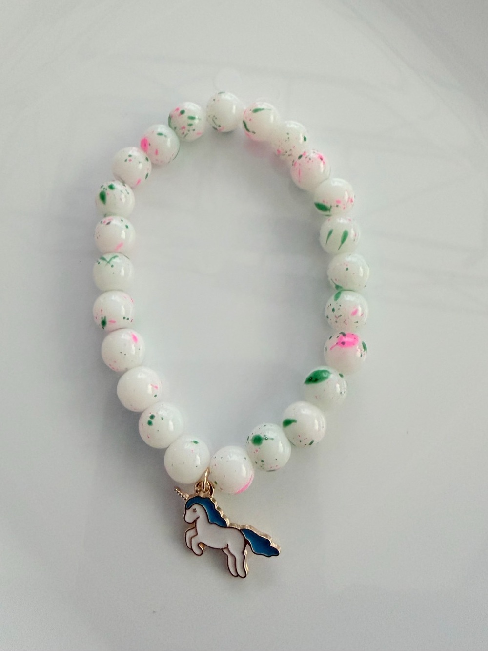 White Beaded Unicorn Charm Bracelet with Pink & Green Speckles